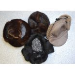 Four vintage hats to include a leather and fur trapper style hat,