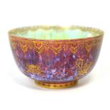 A Wedgwood butterfly ruby ground lustre bowl in the Boston Cup shape, made between 1914 and 1929,