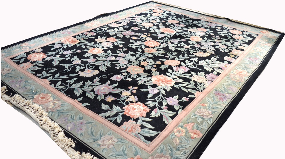 A large black ground floral decorated Chinese Superwash carpet, 390 x 275cm. - Image 2 of 2