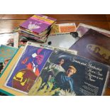 A quantity of vinyl albums and singles to include the Beatles 1962-1966,