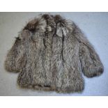 A lady's silver fox three quarter length coat.