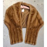 A circa 1950s blonde mink evening wrap, label to the interior, 'Master Furrier Philip Burger,