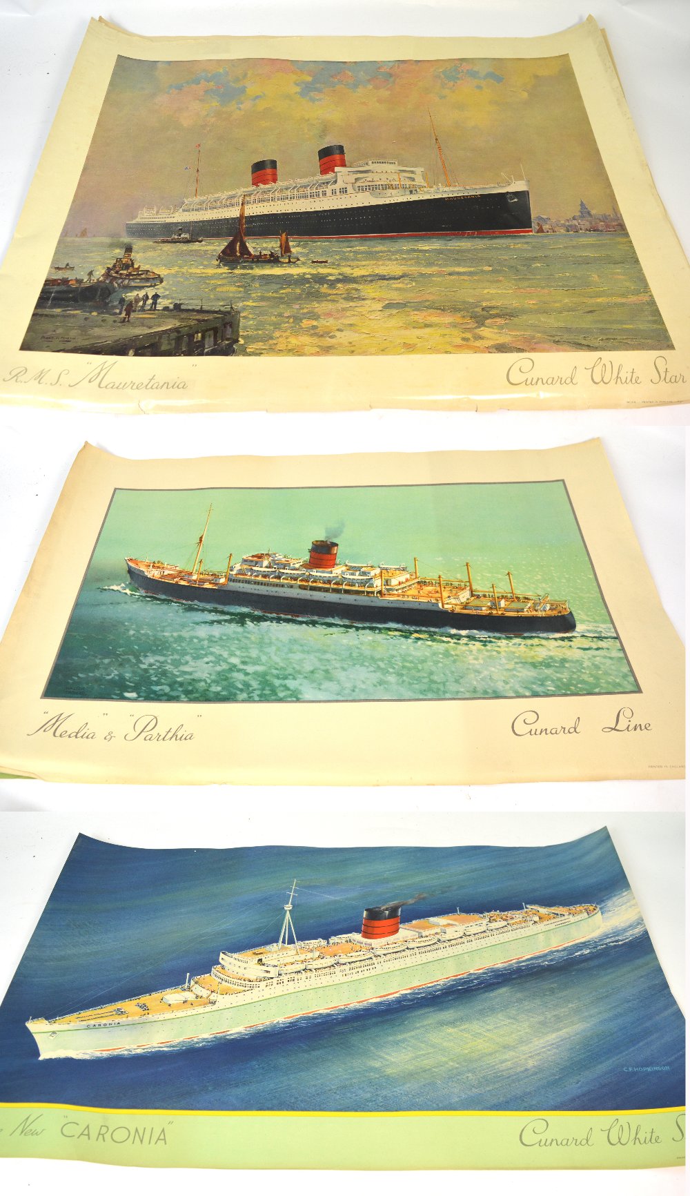 Three shipping-related posters; Cunard White Star Line, 'The New Coronia',