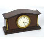 An Edwardian inlaid mantel clock, dial set with Arabic numerals,