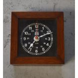 A Sewills of Liverpool oak cased maritime clock, black face set with Arabic numerals.