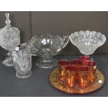 Four pieces of cut and engraved glass to include a lidded vase on tall pedestal base,