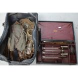 An early 20th century collection of various doctor's and surgical instruments to include syringes,