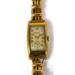 Bulova; 1937 'President' Curvex tank style watch, long curved gold filled case,
