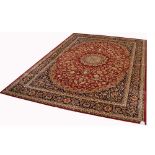 A red ground Keshan style carpet, 280 x 200cm.