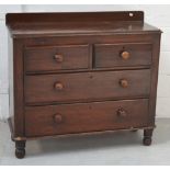 A mahogany two-over-two chest of drawers,