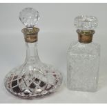 A contemporary cut glass ship's decanter with hallmarked silver collar,