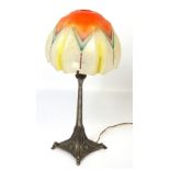 A W.M.F. white metal Art Deco lamp stand with an associated Art Deco glass shade, height 44cm.