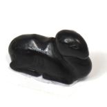 An unusual small Chinese carved dark grey jade pendant modelled as a camel, length 3.5cm.