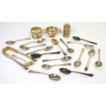 A quantity of mixed hallmarked silver items to include a pair of tongs,