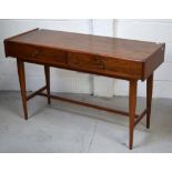 A retro c.1970s teak side/serving table with two drawers, on tapering legs, length 122cm.