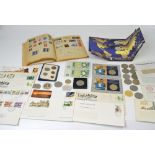 A quantity of collectors coins to include commemorative coins, one pound bank notes,