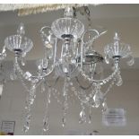 A five branch cut glass chandelier, length 62cm.