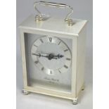 A modern white metal cased London Clock Company carriage clock,