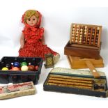 A quantity of toys to include a vintage Sooty xylophone, a set of full size snooker balls,