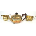 An Elizabeth II hallmarked silver three piece tea service comprising teapot,