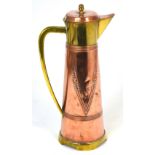 A c.1900 Geberuder Bing (Bing Bros) Art Nouveau copper and brass ewer, height 31cm.