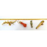 A 9ct gold bracelet, a charm/pendant in the form of a clenched fist, a 9ct gold brooch,