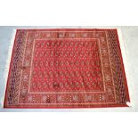 A red ground Bokhara style rug, 190 x 140cm.