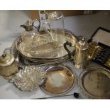 A quantity of silver plate including a twin-handled tea tray, gallery tray,