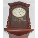 A reproduction wooden cased 30 hour German wall clock,