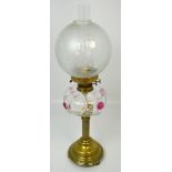 An Arts and Crafts style brass oil lamp,