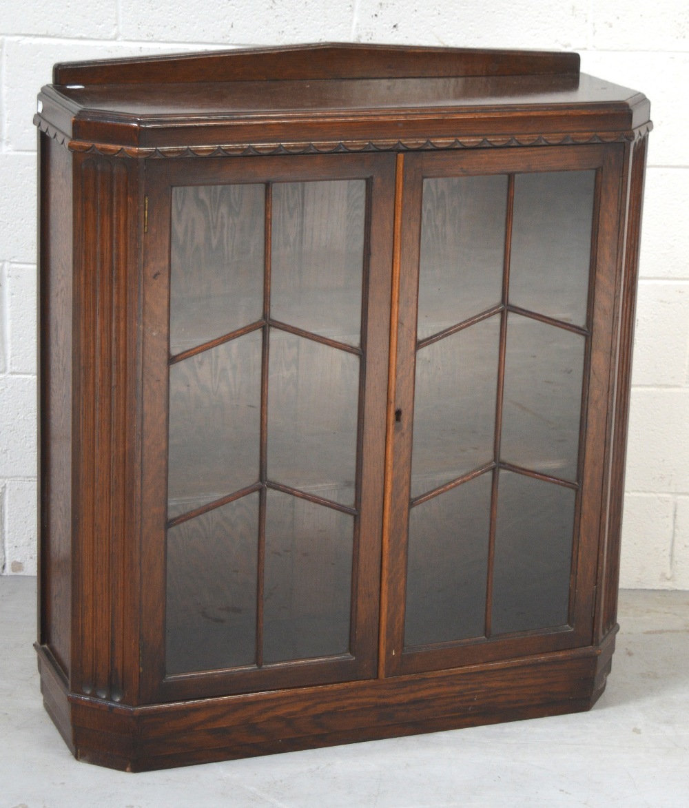 A c1940s oak astragal glazed display cabinet, width 92cm.