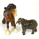 A Beswick model of an elephant and a Beswick model of a cart horse (2).