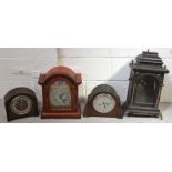 Three mantel clocks to include a thirty one day example the silvered dial set with Roman numerals