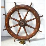 A 19th century mahogany ship's wheel, reputedly form a Chinese clipper, diameter 140cm.