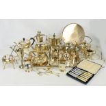 A large quantity of silver plated items including a large twin handled tray, teapots, biscuit box,