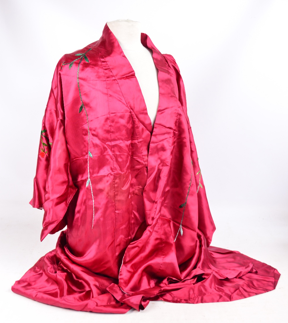 A Japanese red silk floral embroidered kimono. - Image 2 of 2