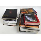 A collection of various Sotheby's and Christie's auction catalogues related to predominantly
