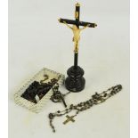 A late 19th century carved ivory Corpus Christi and a quantity of rosary beads for repair.