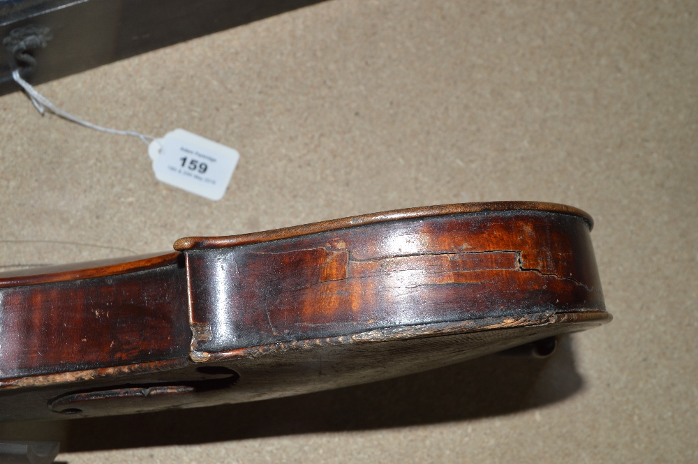 A full size violin with one-piece back, length of back 36cm, indistincly labelled, cased with a bow. - Image 2 of 4