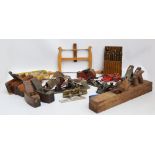 A quantity of woodworking tools including Stanley and Record planes,