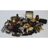 A quantity of costume jewellery including brooches, beads, etc,