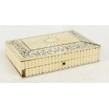 A 19th century ivory and pen work decorated rectangular trinket box with floral decorated panel,