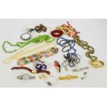 A quantity of costume jewellery including bead necklaces, fashion watches, brooches, etc.