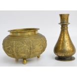 An Eastern brass cache pot of squat bulbous form with raised rim,