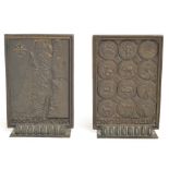 A pair of bronze rectangular bookends with cast decoration,