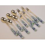 A cased set of five Korean enamel decorated dessert forks and spoons, length 14cm.