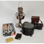 A small quantity of collectors' items including a chrome oil lamp,