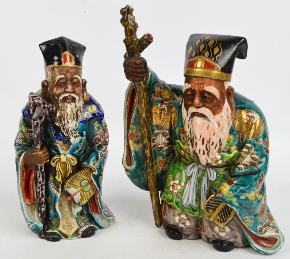 Two late 19th/early 20th century porcelain figures of one of the Immortals,