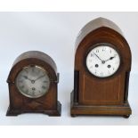 An Edwardian mahogany and inlaid lancet shaped eight day mantel clock,