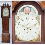 An early 19th century oak and mahogany eight day longcase clock,